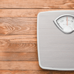 a scale on a wood floor