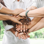 Older adults put their "hands-in" in a collaborative effort.