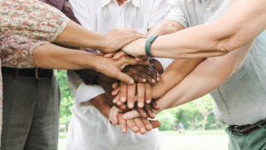 Older adults put their "hands-in" in a collaborative effort.